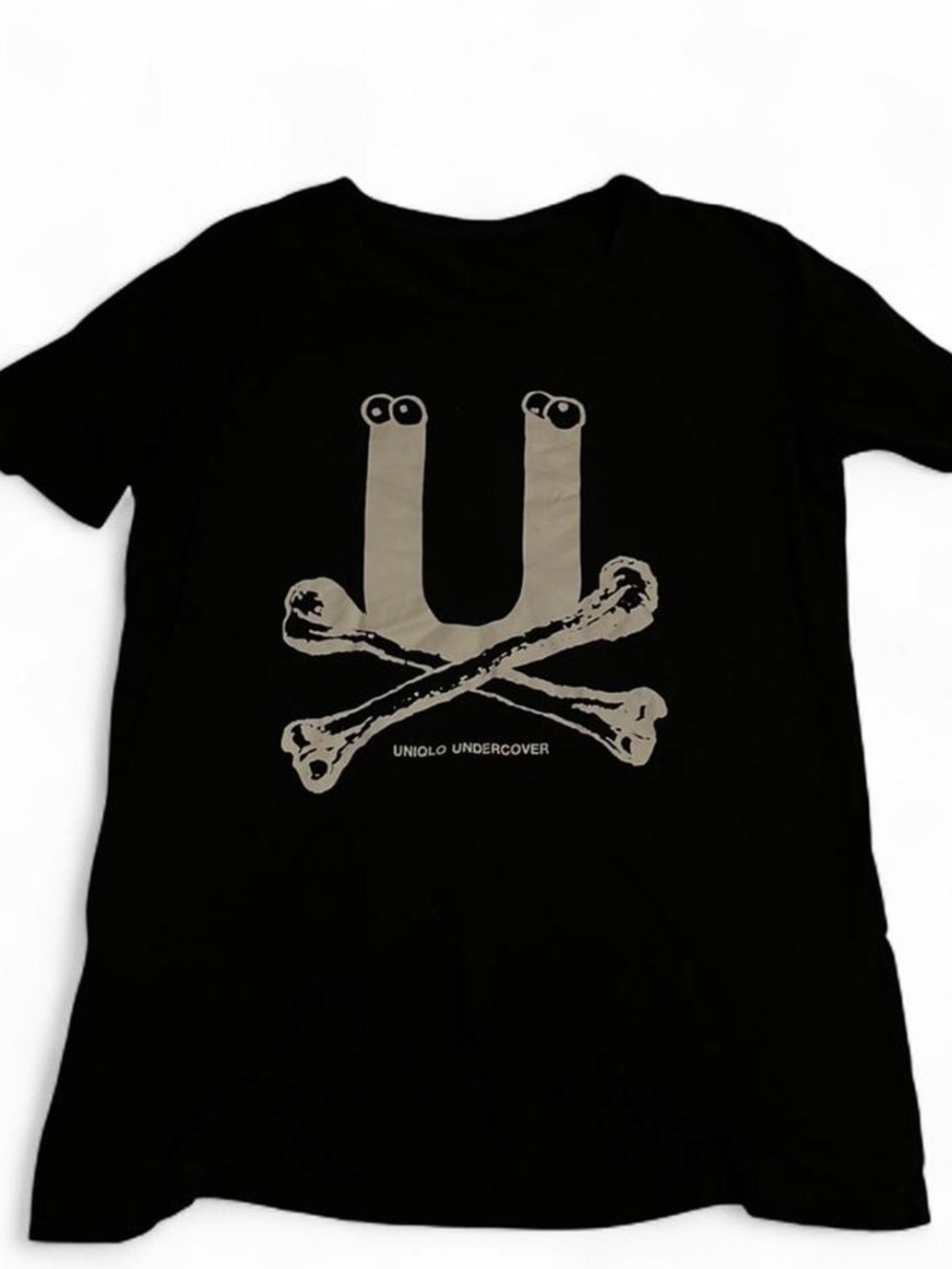 Uniqlo Black Tee with Beige Skull-and-Bones Graphic